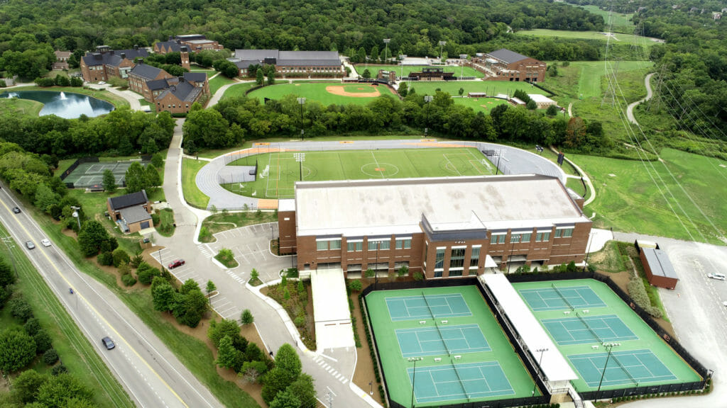 areal view of Ensworth building with tennis court and soccer field